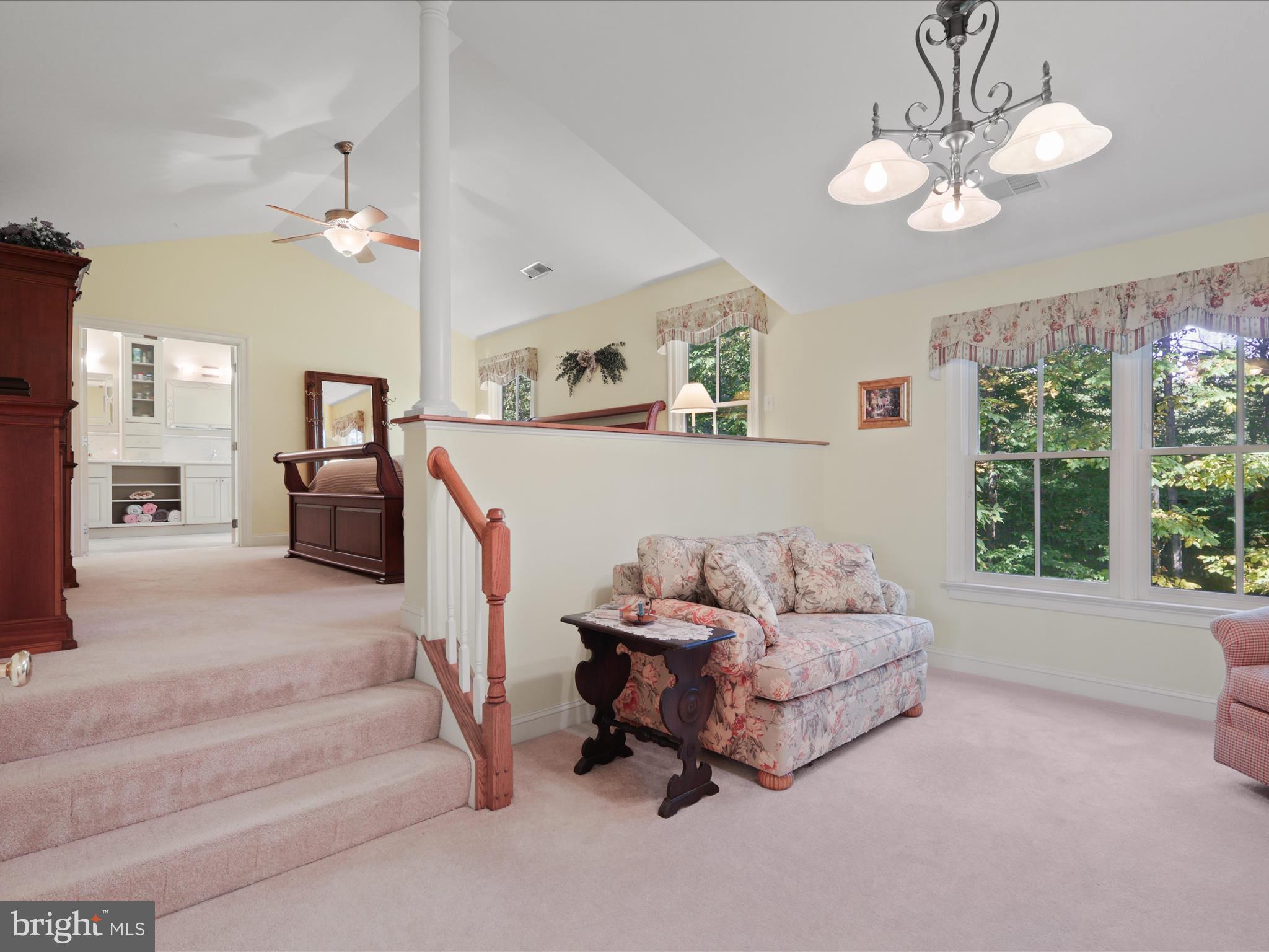 12848 Redbird Ridge Clifton, VA 20124 - Photo 30 of 76 a living room with furniture and a large window