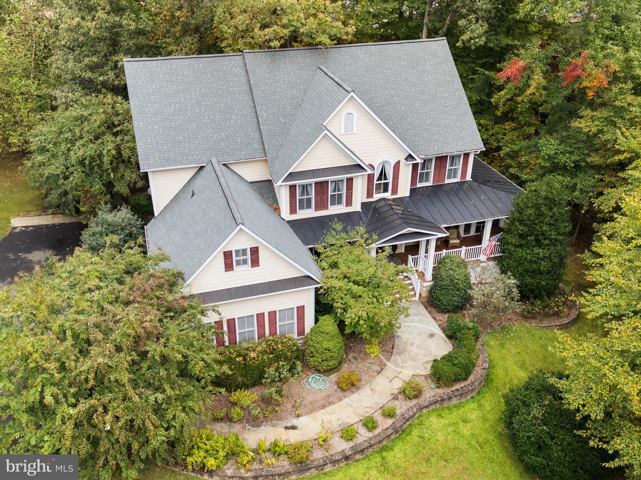 12848 Redbird Ridge Clifton, VA 20124 - Photo 3 of 76 aerial view of a house with yard and green space
