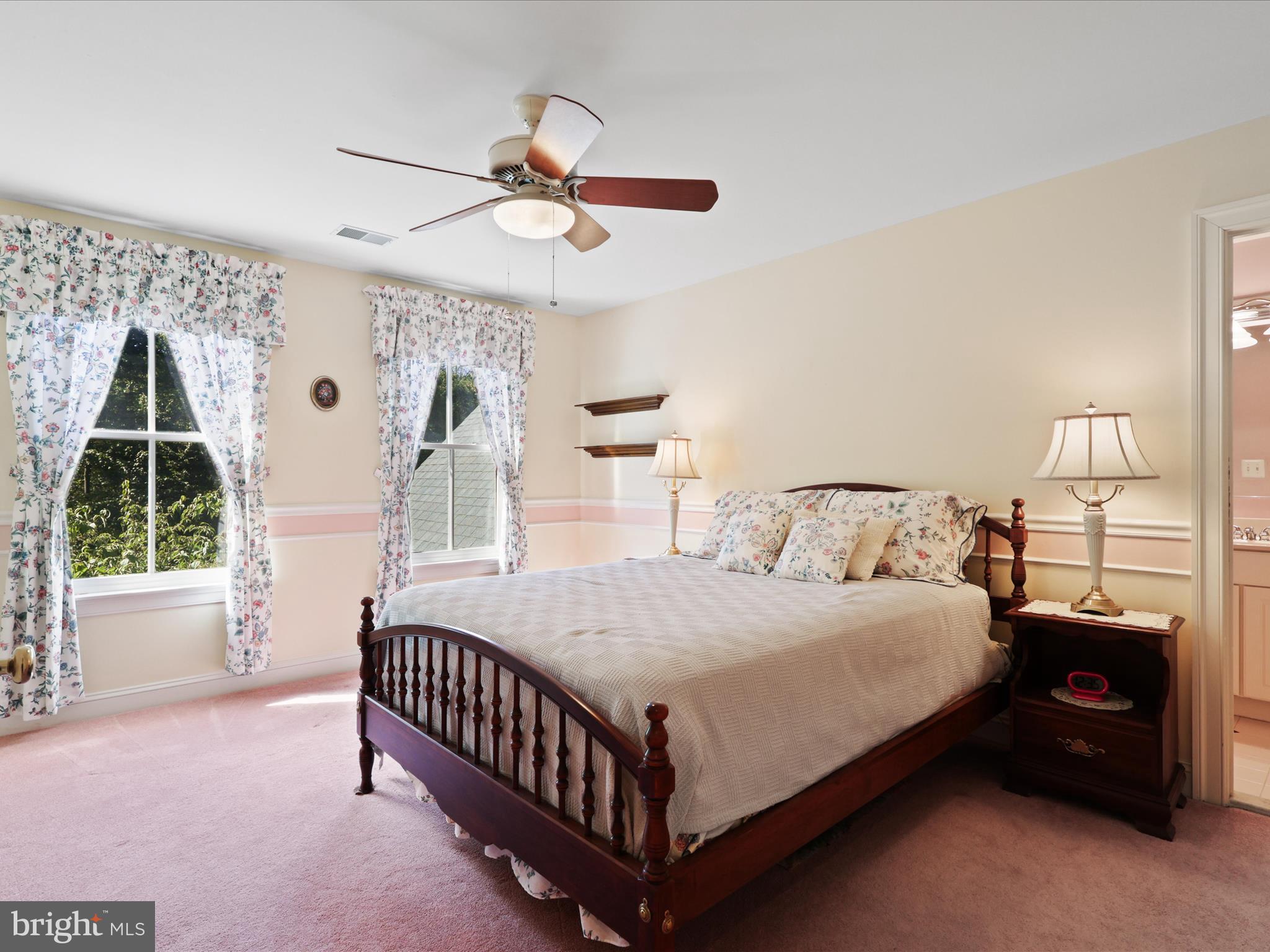 12848 Redbird Ridge Clifton, VA 20124 - Photo 35 of 76 a bedroom with a bed window and bed