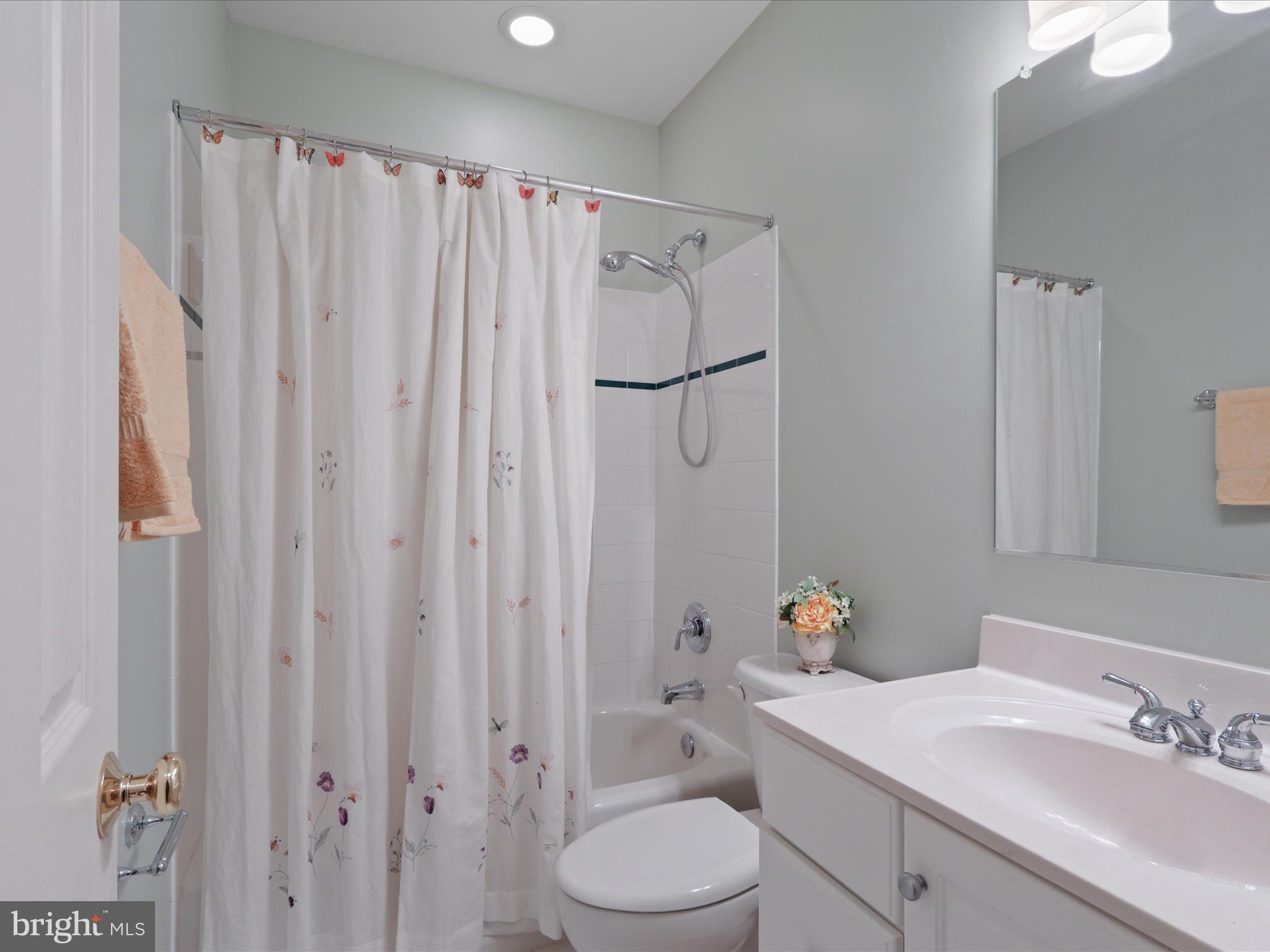 12848 Redbird Ridge Clifton, VA 20124 - Photo 46 of 76 a bathroom with a sink toilet and shower