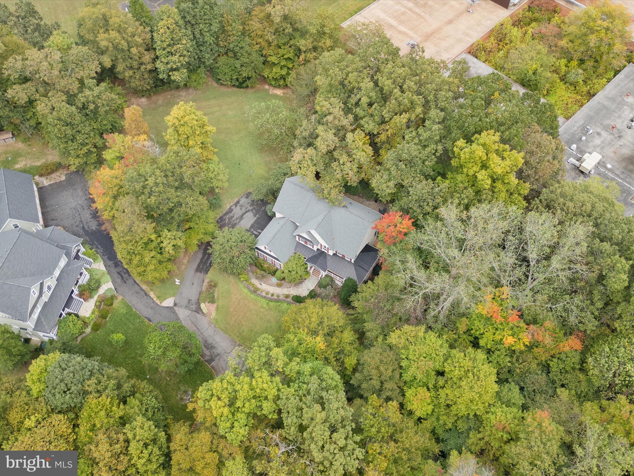 12848 Redbird Ridge Clifton, VA 20124 - Photo 57 of 76 an aerial view of a house with a yard and lake view