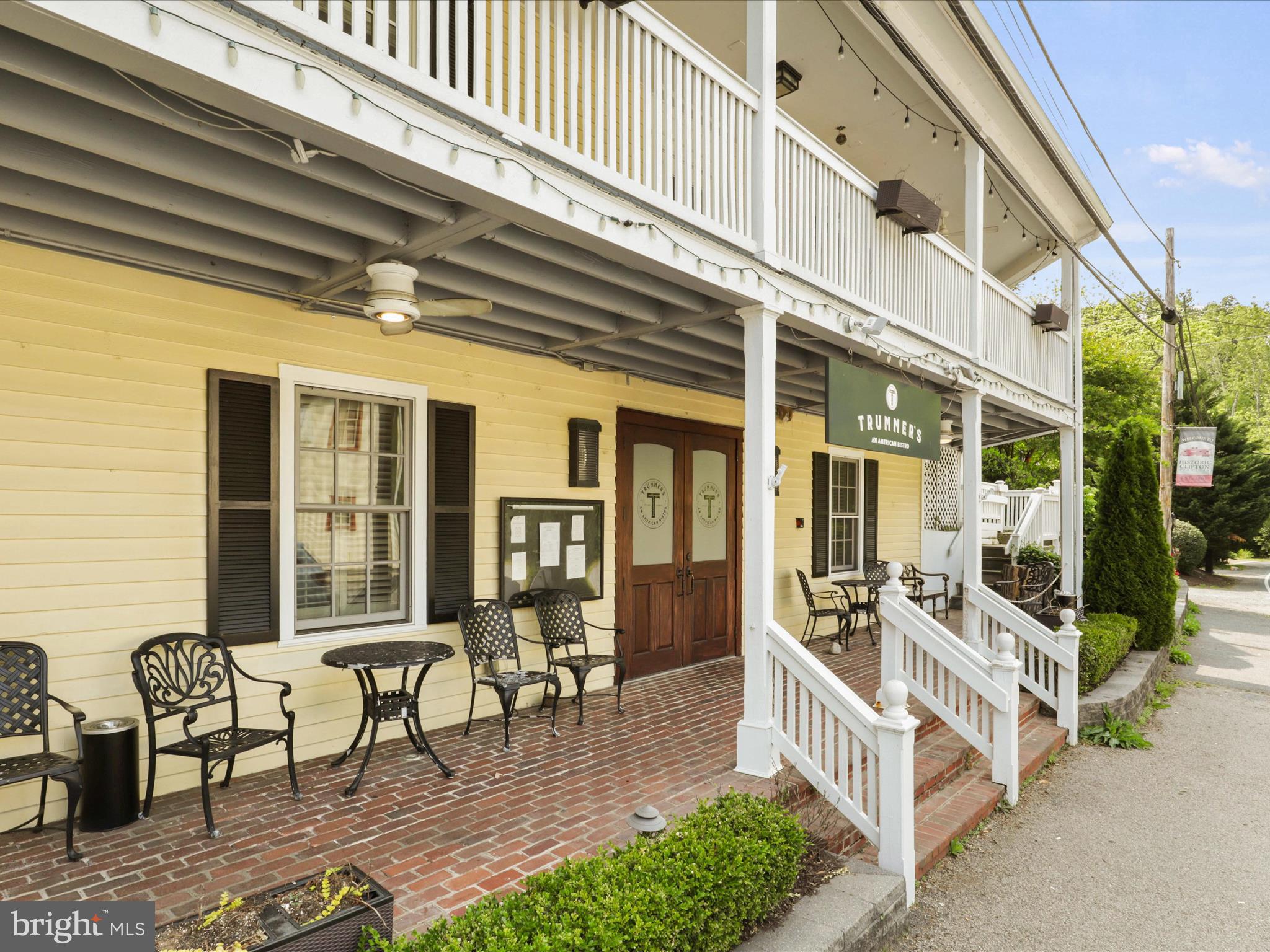 12848 Redbird Ridge Clifton, VA 20124 - Photo 68 of 76 a view of a house with outdoor seating area