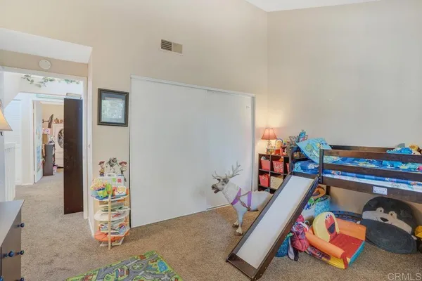 a room with toys and wooden floor