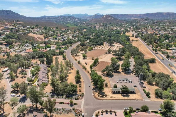 an aerial view of a city with lots of residential buildings