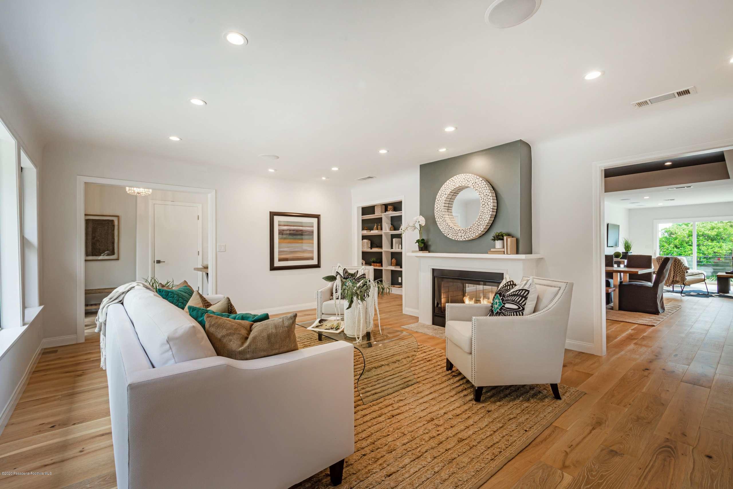 3590 Fairmeade Road Pasadena, CA 91107 - Photo 11 of 45 a living room with furniture and a fireplace