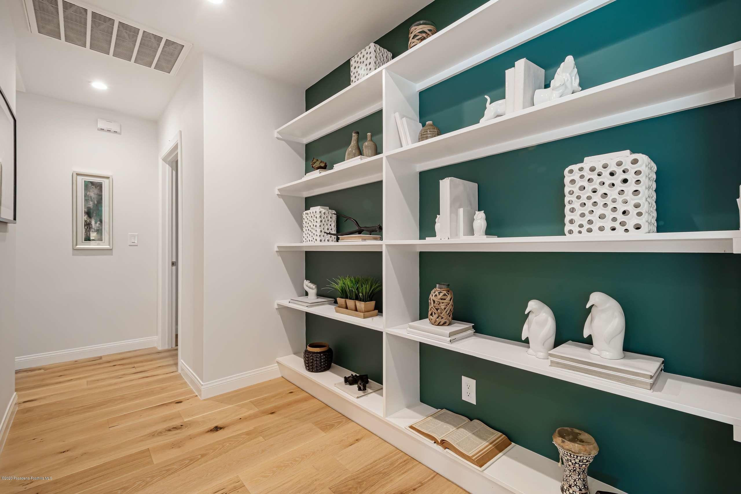 3590 Fairmeade Road Pasadena, CA 91107 - Photo 26 of 45 a workspace with furniture and wooden floor