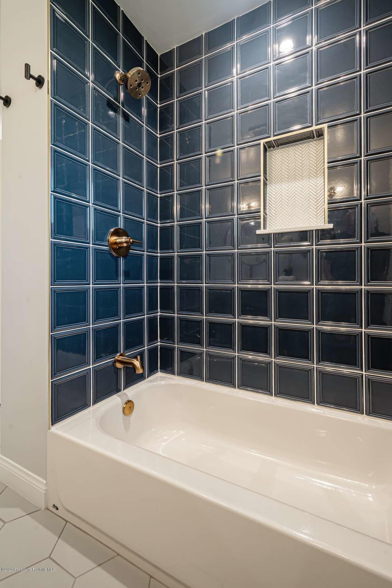 3590 Fairmeade Road Pasadena, CA 91107 - Photo 33 of 45 a view of a bathtub in a bathroom