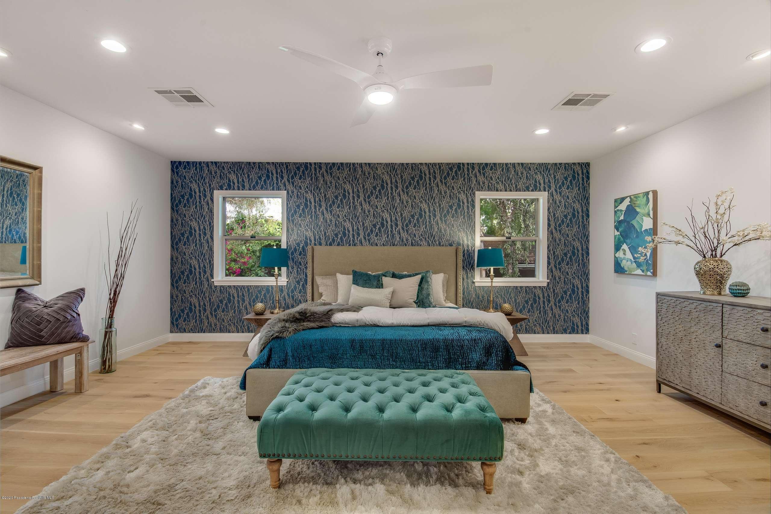 3590 Fairmeade Road Pasadena, CA 91107 - Photo 34 of 45 a bedroom with a large bed and a couch