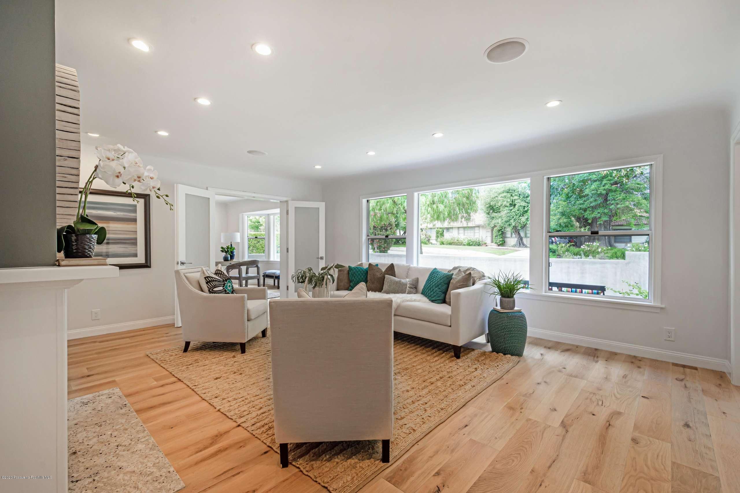 3590 Fairmeade Road Pasadena, CA 91107 - Photo 9 of 45 a living room with furniture and large windows
