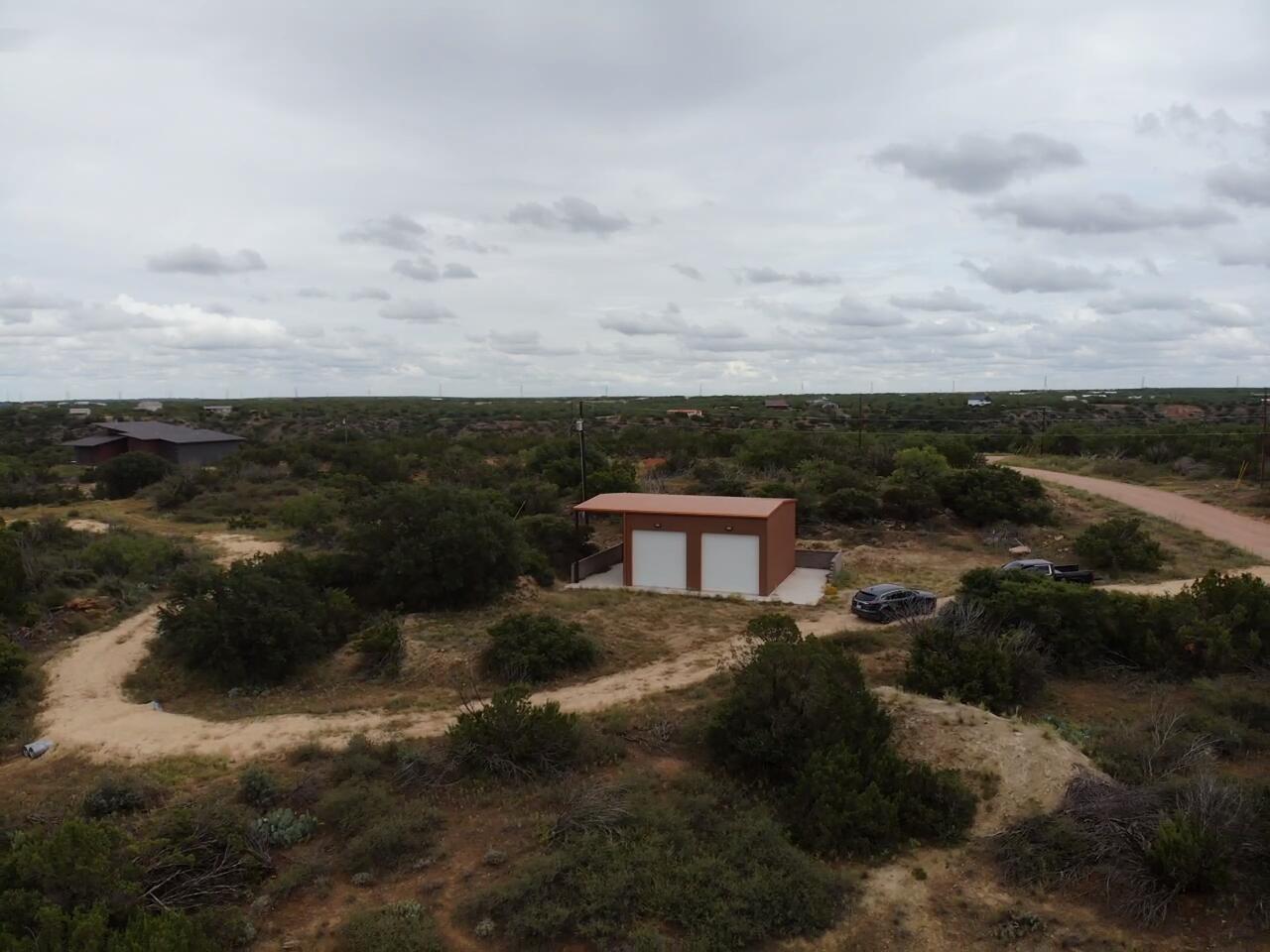 70 Ward Snyder, TX 79549 - Photo 9 of 16 a view of a lake with lots of trees