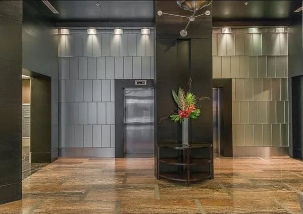 a view of a entryway door of the room