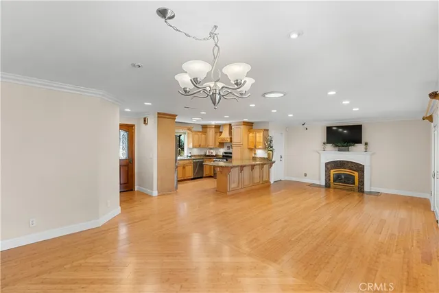 a view of a kitchen with a sink and a microwave