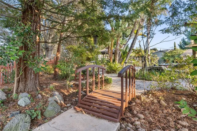 a view of outdoor space with deck and garden