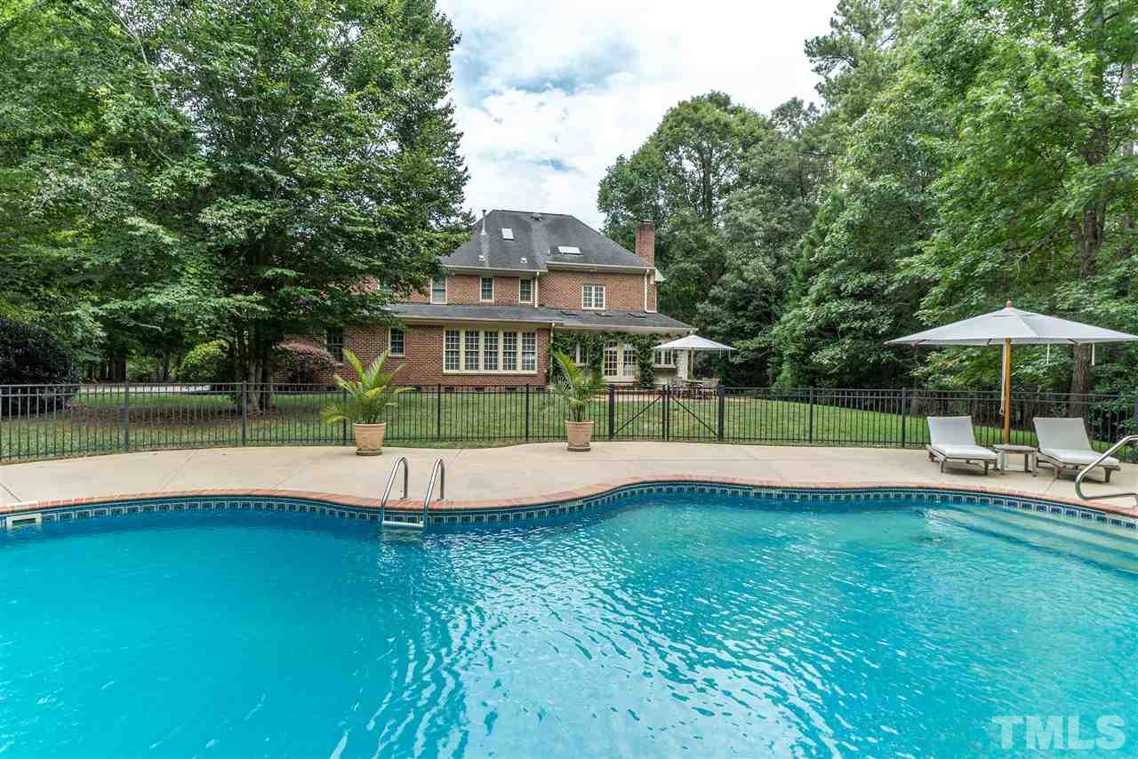 5233 Wildmarsh Drive Raleigh, NC 27613 - Photo 23 of 25 a view of a house with a yard
