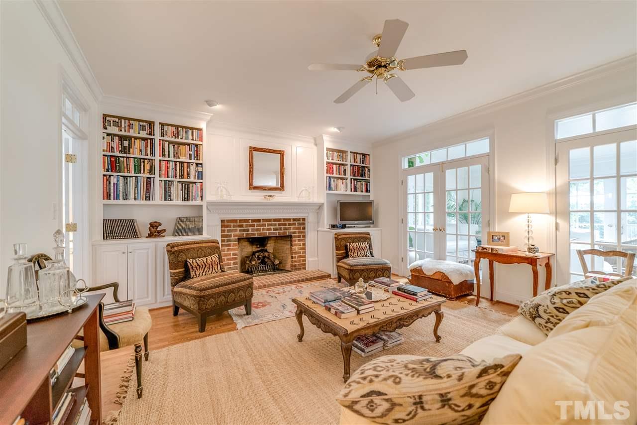 5233 Wildmarsh Drive Raleigh, NC 27613 - Photo 10 of 25 a living room with furniture fireplace and window