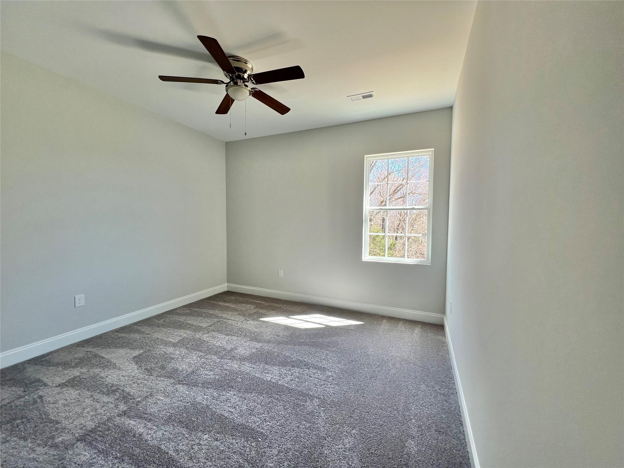 5322 Pond Bluff Drive Monroe, NC 28112 - Photo 20 of 21 a view of empty room with ceiling fan