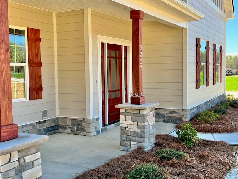5322 Pond Bluff Drive Monroe, NC 28112 - Photo 2 of 21 a front view of a house with a yard