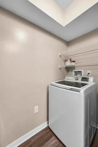 a utility room with dryer and washer