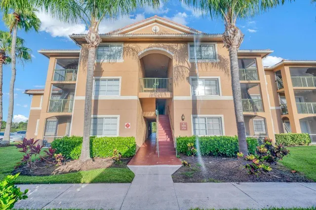 a front view of a multi story residential apartment building