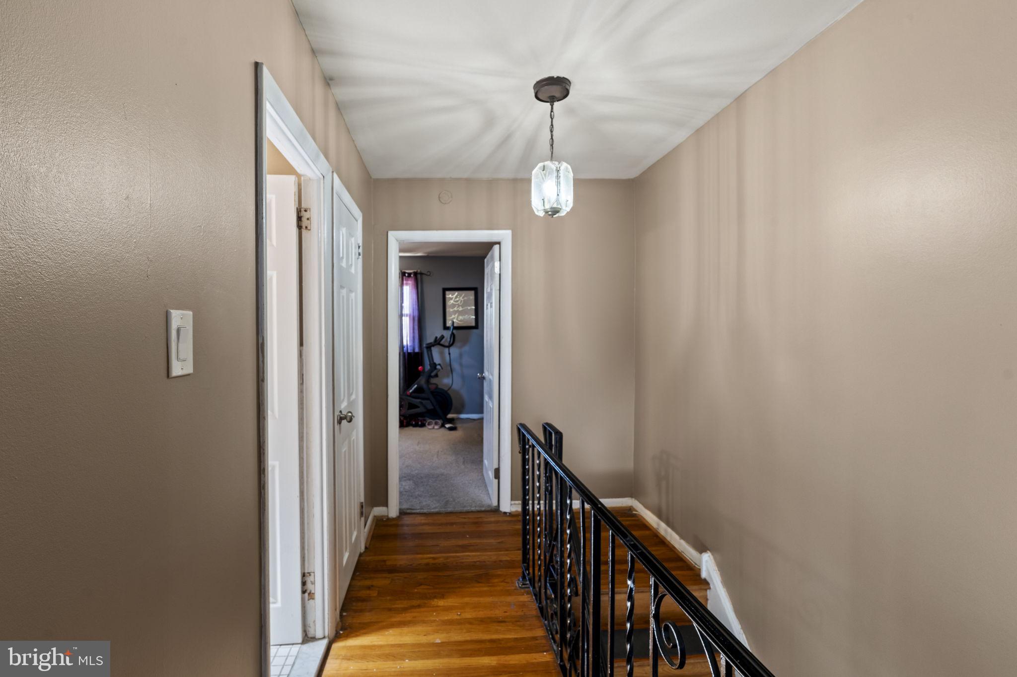 3329 Morning Glory Road Philadelphia, PA 19154 - Photo 18 of 32 Inviting hallway with warm tones.