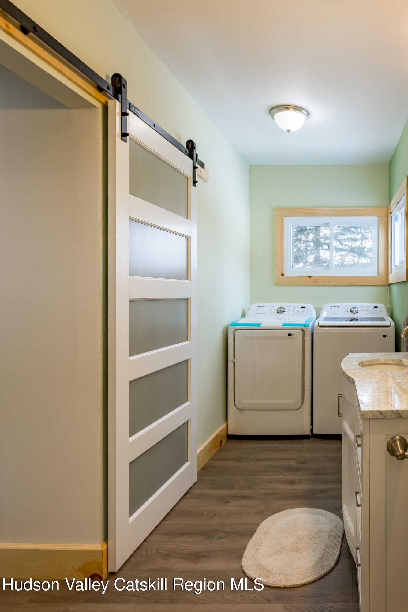 4030 Vega Mountain Road Roxbury, NY 12474 - Photo 26 of 29 a utility room with a sink a washer and dryer