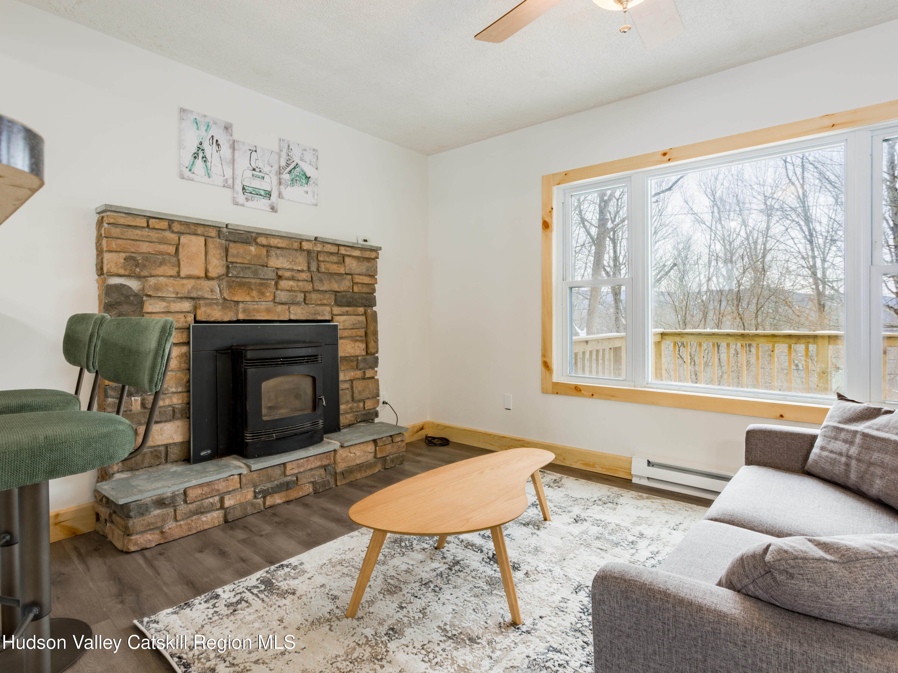 4030 Vega Mountain Road Roxbury, NY 12474 - Photo 8 of 29 a living room with furniture a table and a large window