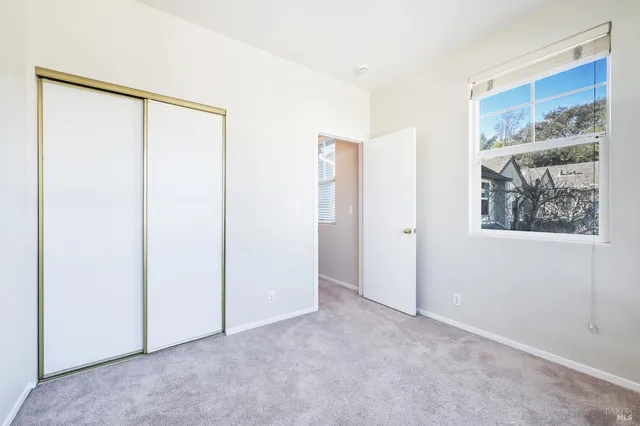 a view of a closet in a room
