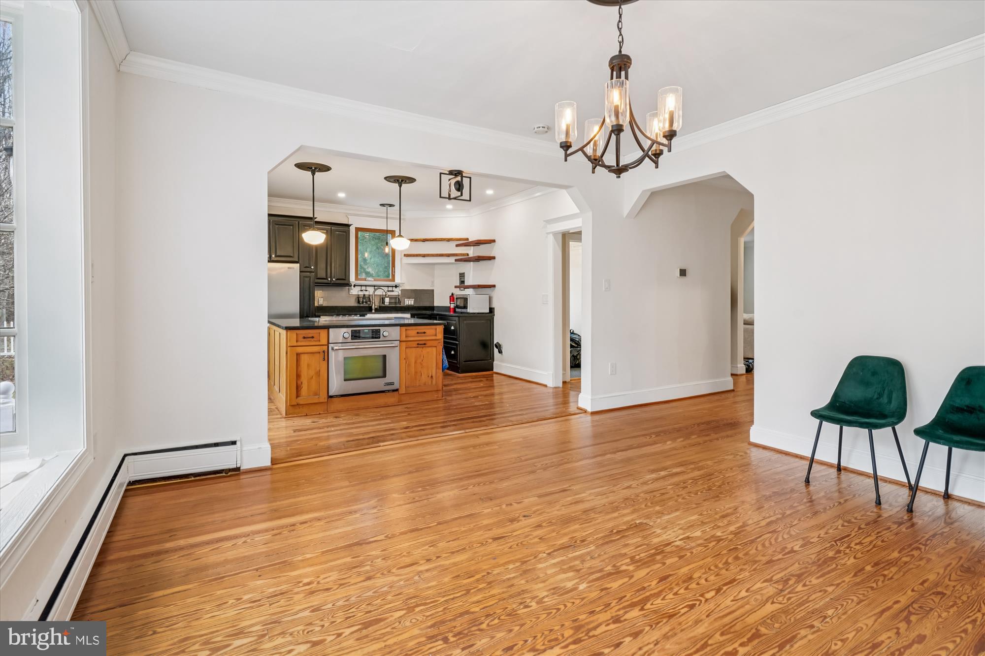 19 Walnut Hill Road La Plata, MD 20646 - Photo 16 of 70 a view of a dining room with furniture a chandelier and wooden floor