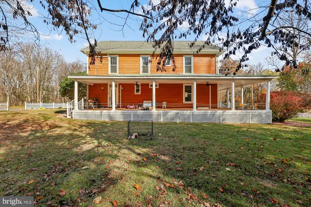 a front view of a house with a outdoor view
