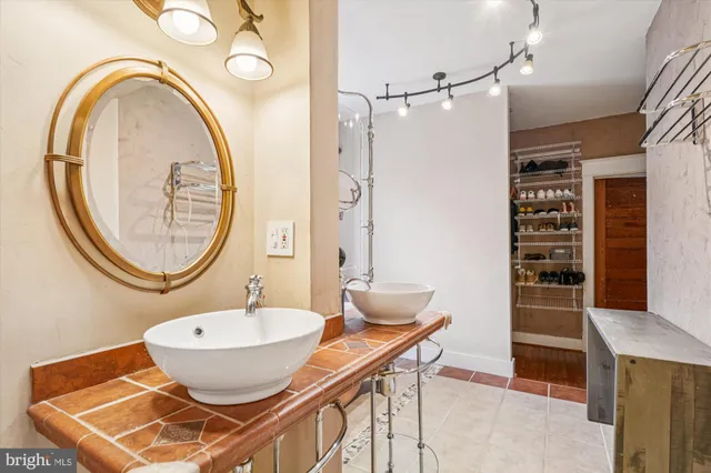 a view of a patio with a table and chairs