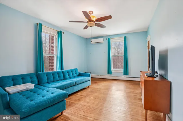 a front view of a house with yard and seating area