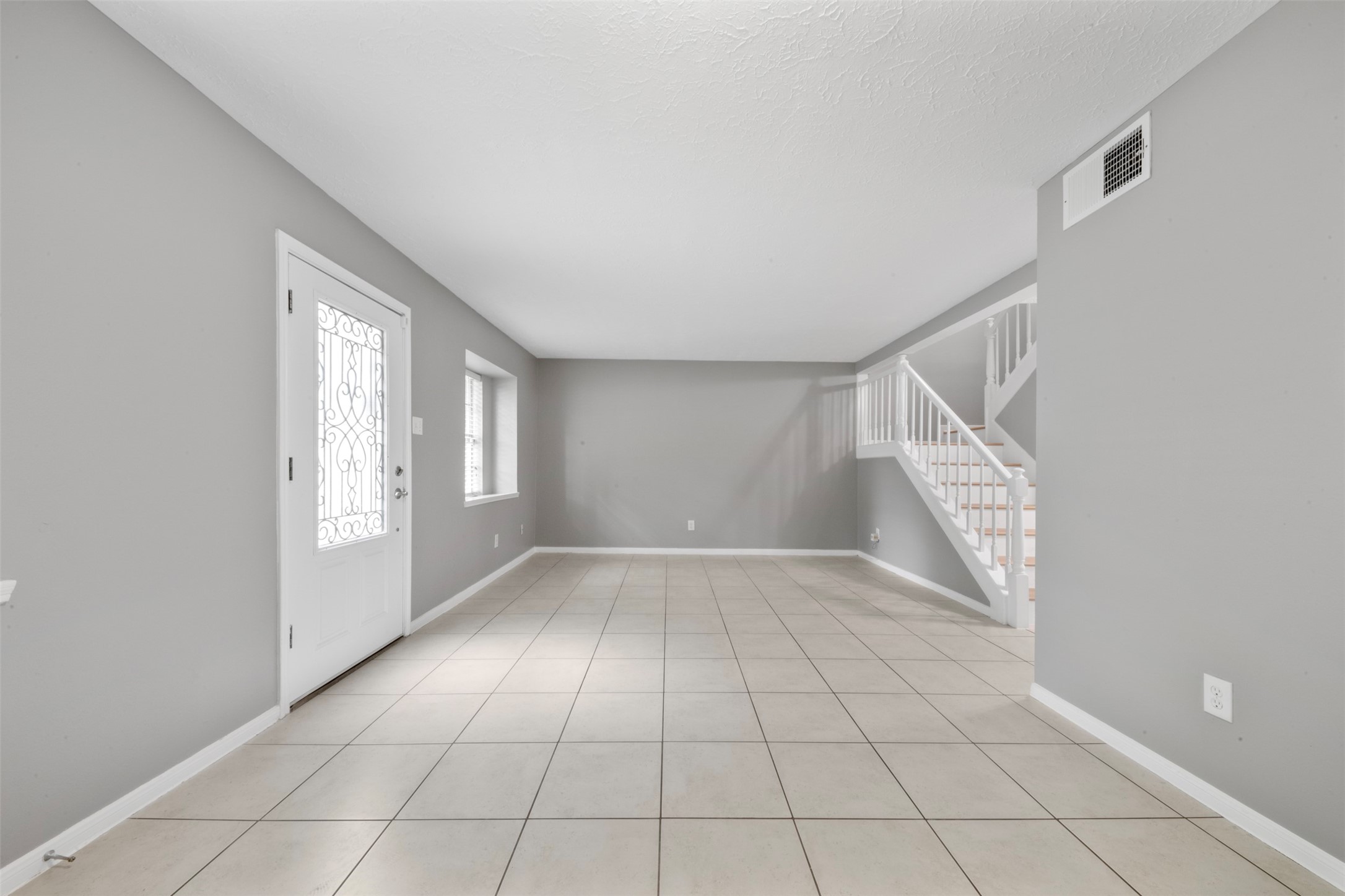 11610 South Kirkwood Road Houston, TX 77477 - Photo 5 of 25 Dining on one side and flex area on other