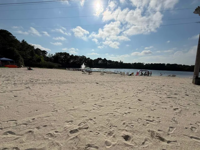 a room with gym equipment and a flat screen tv