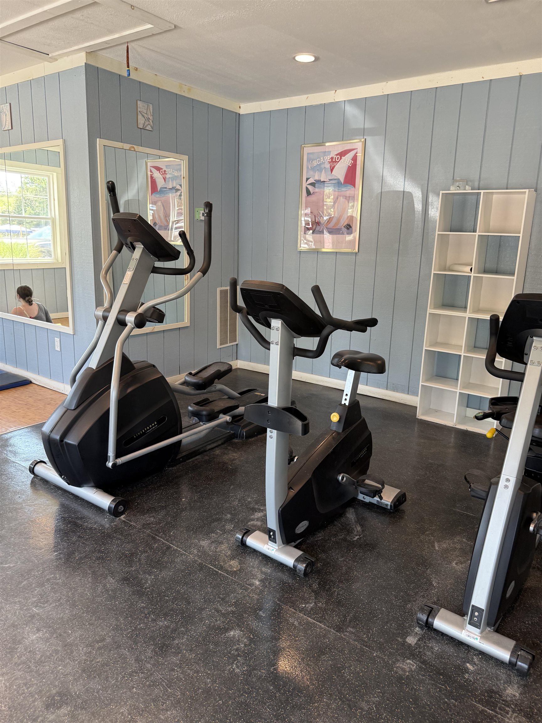 515 Corsons Tavern Road Ocean View, NJ 08230 - Photo 14 of 18 a room with gym equipment and a flat screen tv