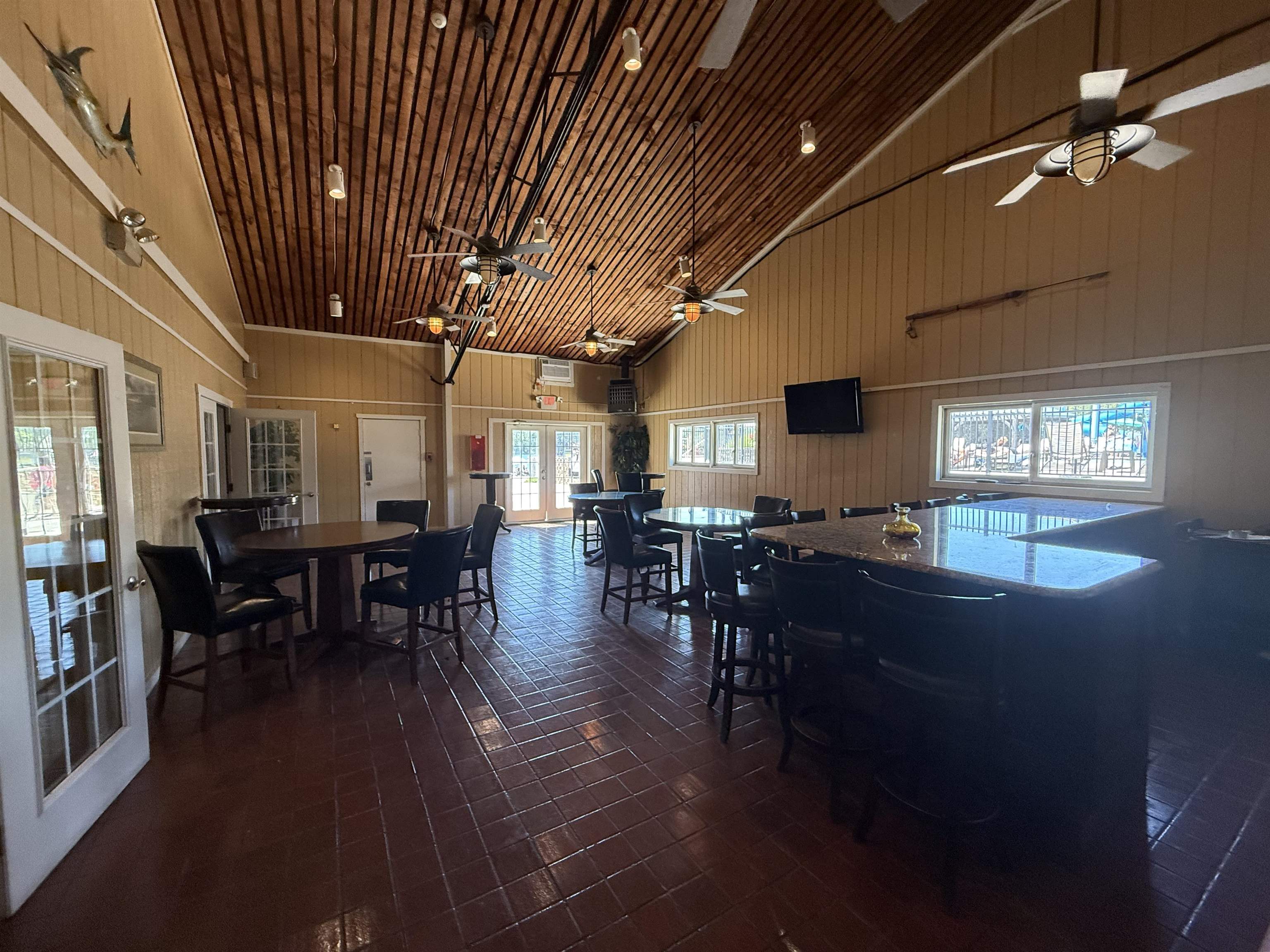 515 Corsons Tavern Road Ocean View, NJ 08230 - Photo 15 of 18 a view of a dining room with furniture window and wooden floor