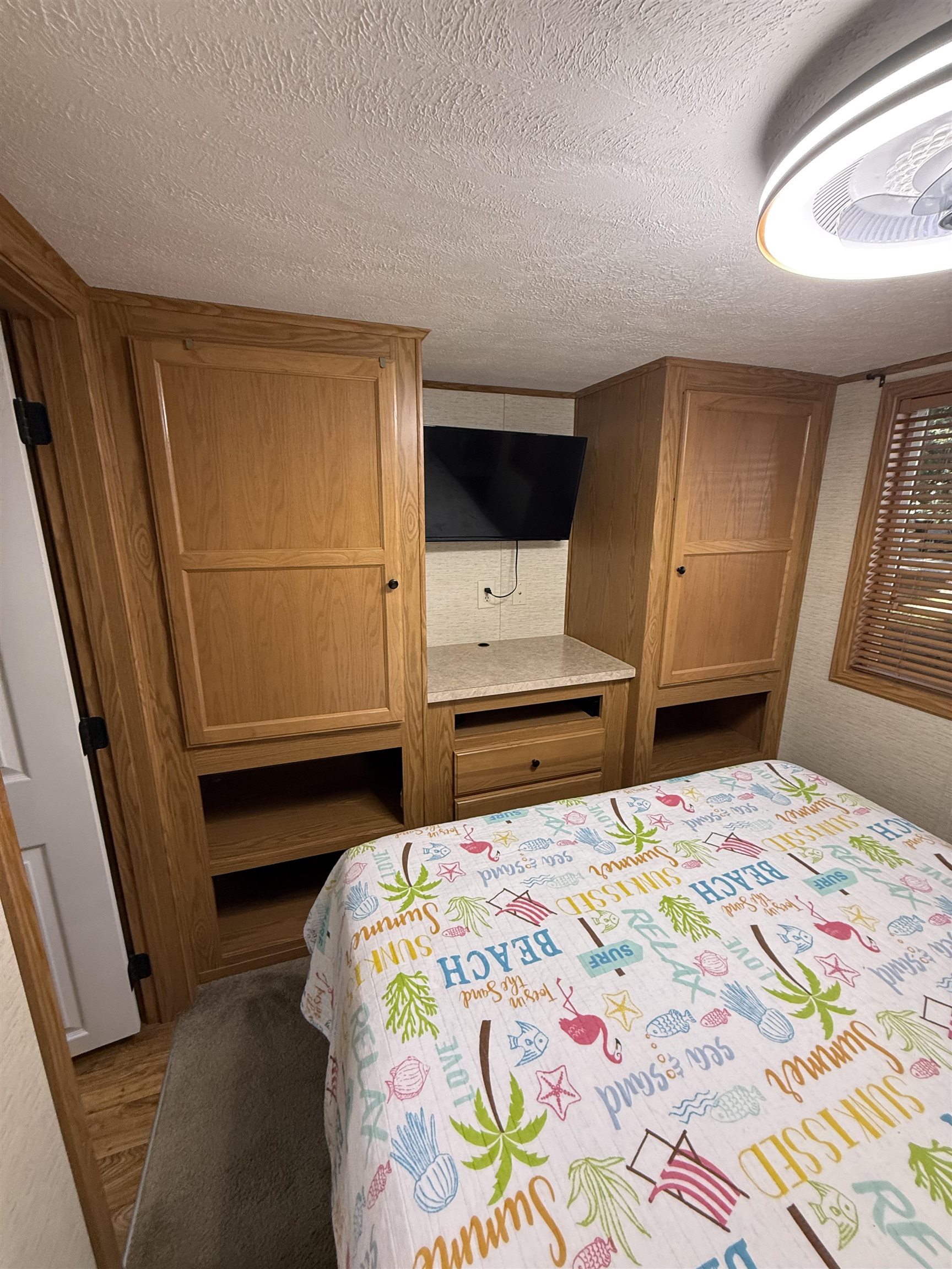 515 Corsons Tavern Road Ocean View, NJ 08230 - Photo 7 of 18 a bedroom with a bed and a window