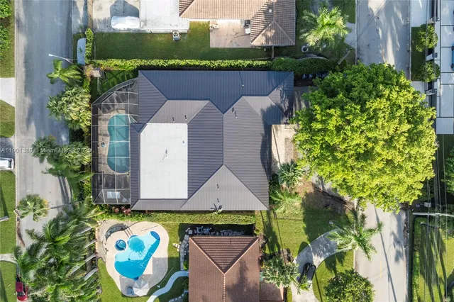 a view of a swimming pool with a patio