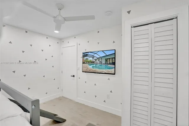 a kitchen with a table and chairs