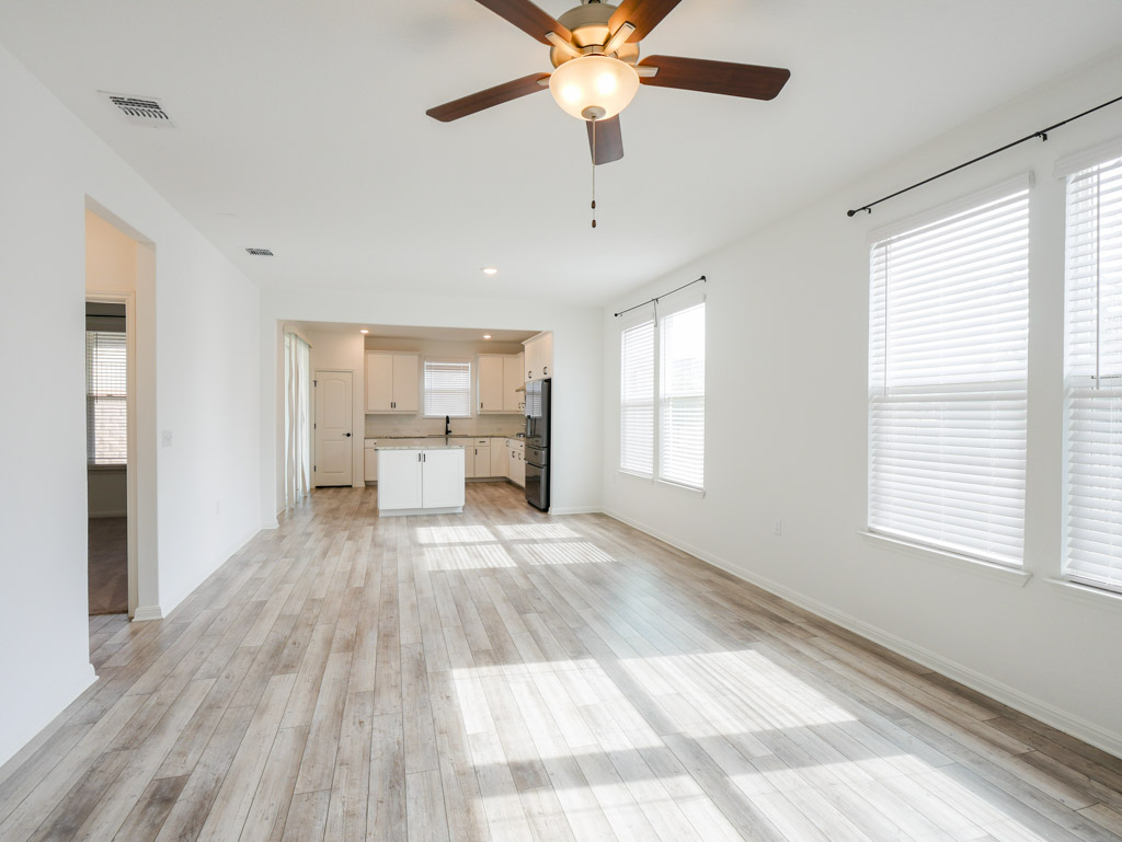 103 Kitty Hawk Road Georgetown, TX 78633 - Photo 17 of 34 a view of a living room a window and a chandelier fan