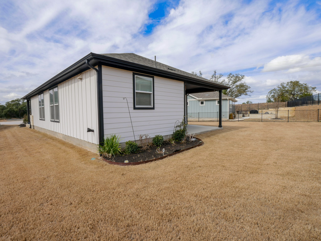 103 Kitty Hawk Road Georgetown, TX 78633 - Photo 34 of 34 a front view of a house with garden