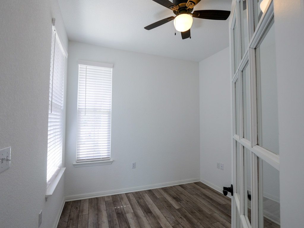 103 Kitty Hawk Road Georgetown, TX 78633 - Photo 6 of 34 a view of an empty room with a window