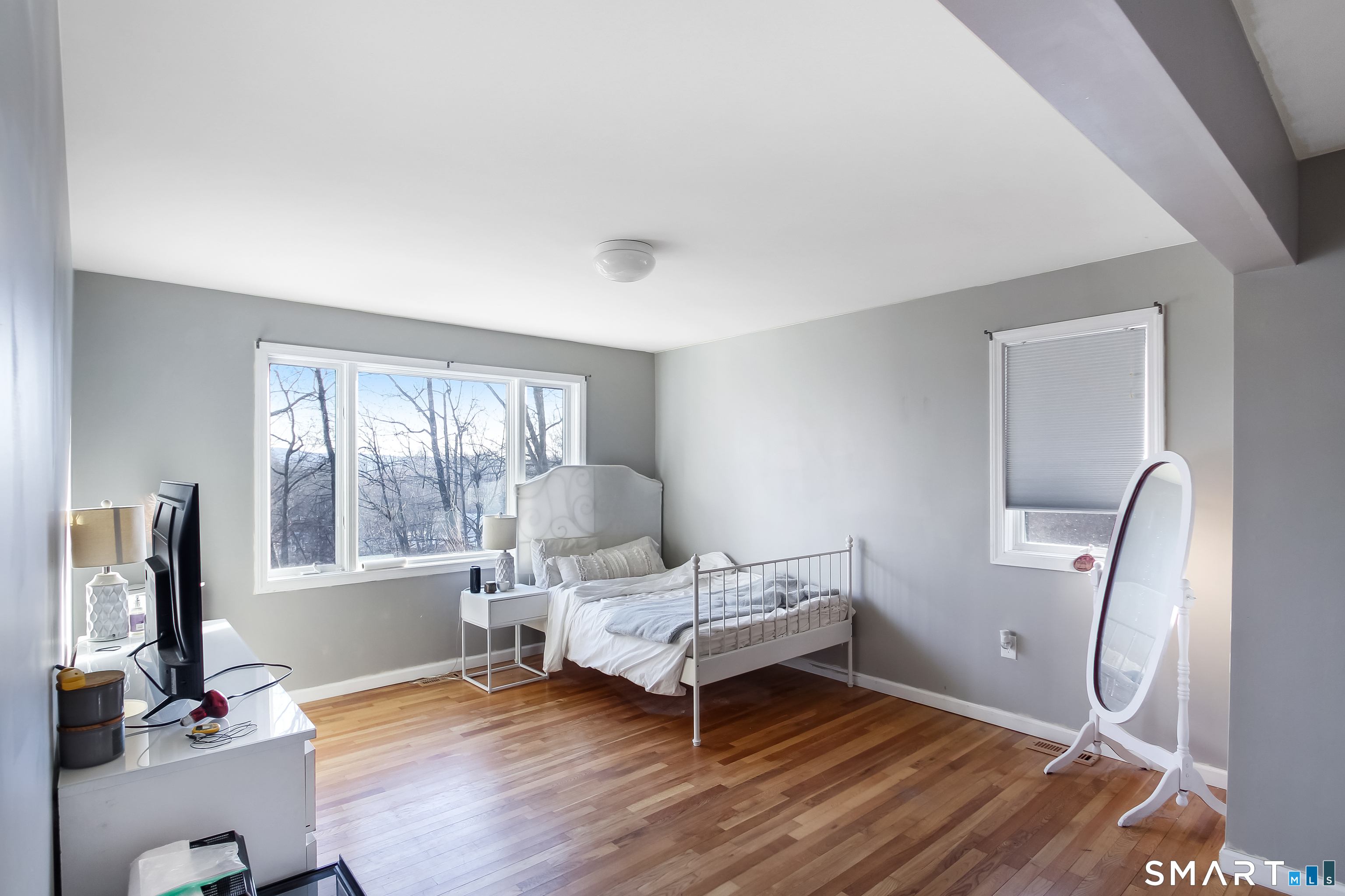 91 Insalaco Drive Windham, CT 06280 - Photo 17 of 20 a bedroom with a bed and wooden floor