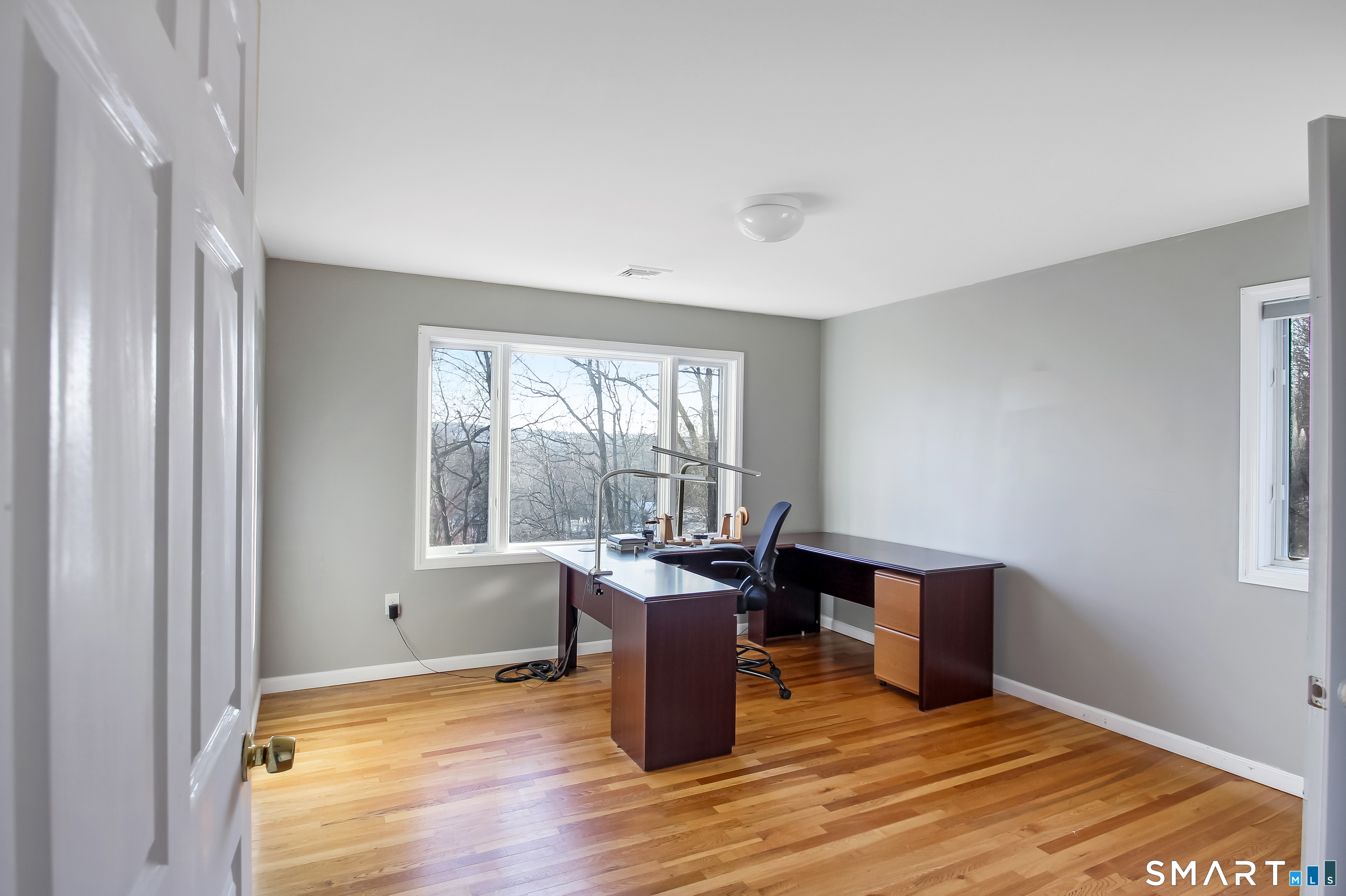 91 Insalaco Drive Windham, CT 06280 - Photo 20 of 20 a view of a workspace with furniture and a window