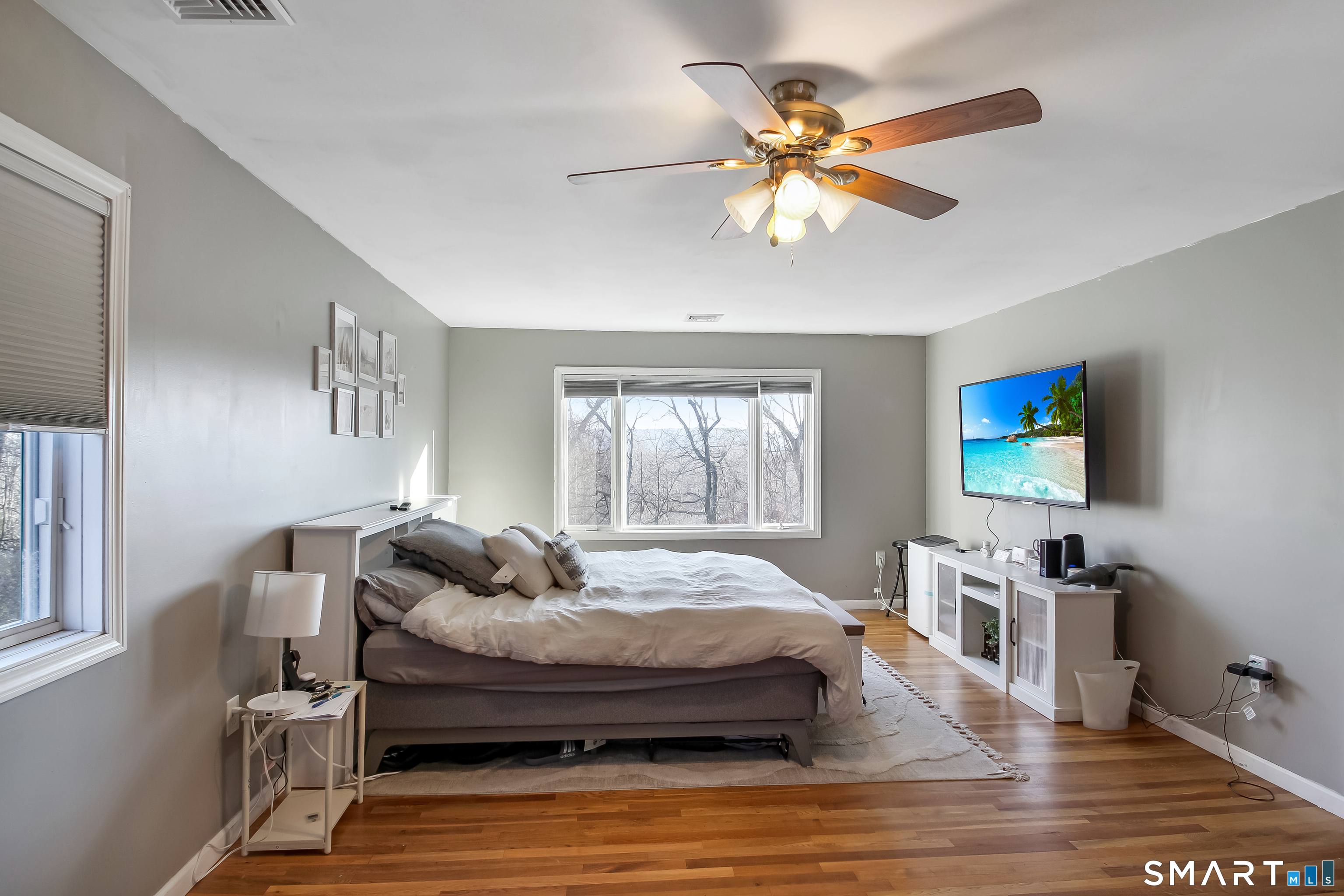 91 Insalaco Drive Windham, CT 06280 - Photo 10 of 20 a bedroom with a bed and wooden floor