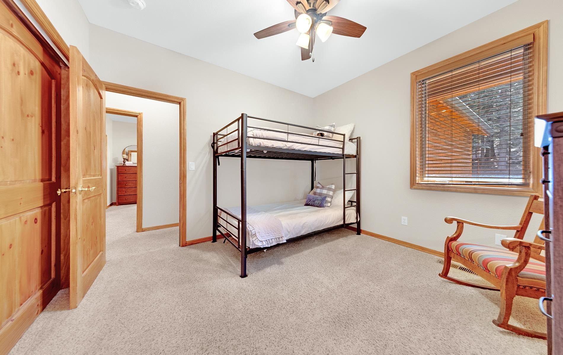 627 Deep Forest Road Lake Almanor, CA 96137 - Photo 22 of 29 a bedroom with furniture and a window