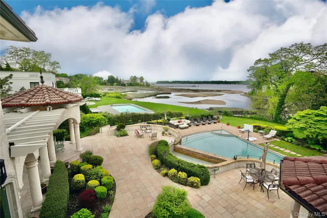 an aerial view of a house with a garden