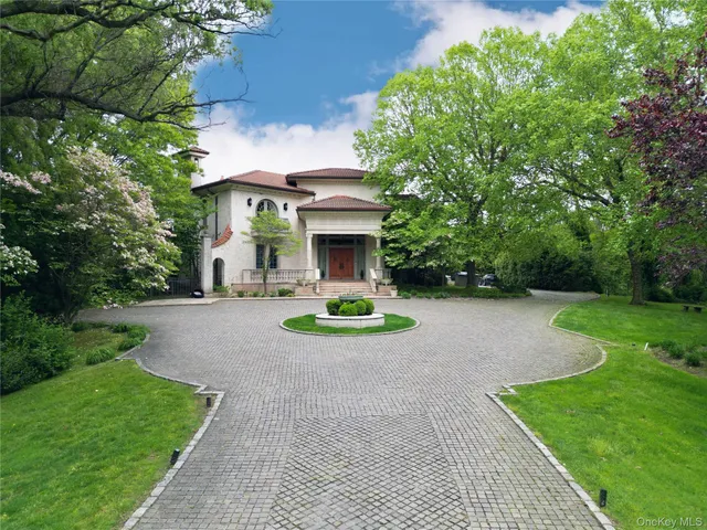 a view of house with outdoor space and garden