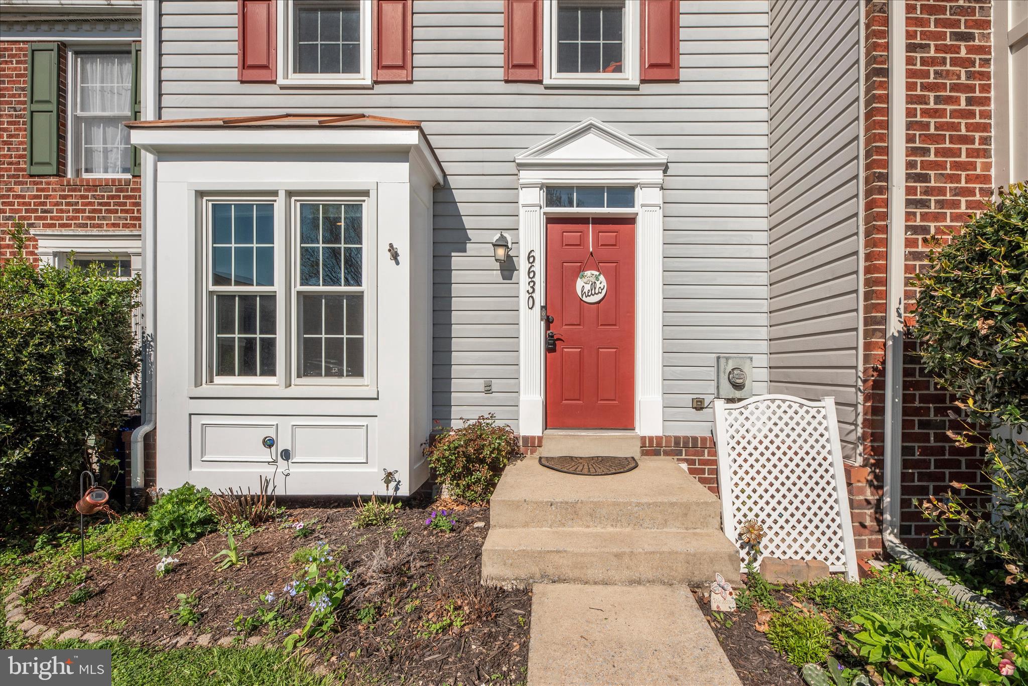 6630 Commodore Court New Market, MD 21774 - Photo 2 of 68 a front view of a house with a yard