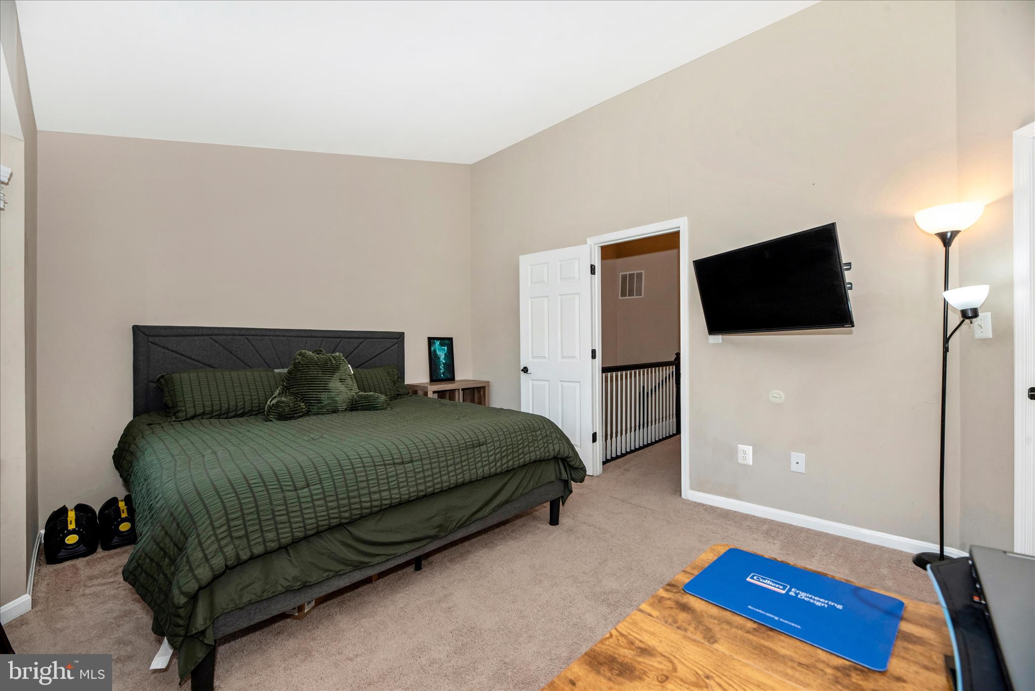 6630 Commodore Court New Market, MD 21774 - Photo 21 of 68 a bedroom with a bed and a flat screen tv