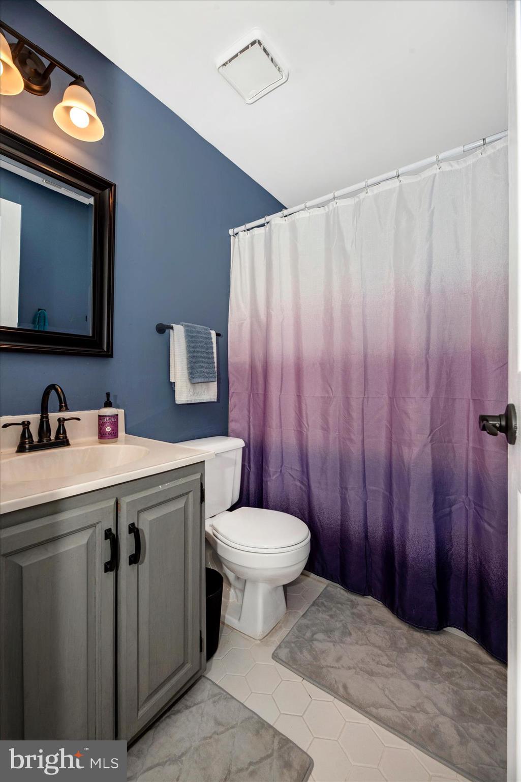 6630 Commodore Court New Market, MD 21774 - Photo 36 of 68 a bathroom with a sink toilet and vanity